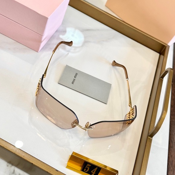 Miu Miu Rimless Sunglasses with Brown Gradient Lenses and Gold Accents main image 4